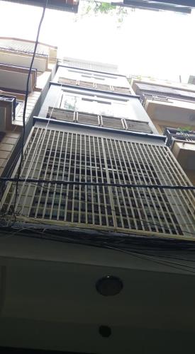 Bán nhà phố Hào Nam, DT 40m2 x 6 tầng, MT 4m, ô tô đỗ cửa.giá 6,5 tỷ