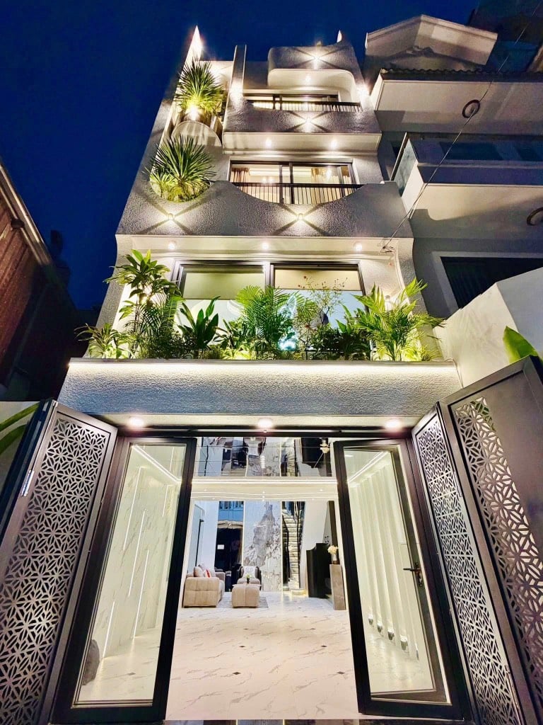 BÁN NHÀ HXH LÊ VĂN THỌ, PHƯỜNG 14, GÒ VẤP, 5 TẦNG NGANG 4,5x12M, 8 TỶ NHỈNH