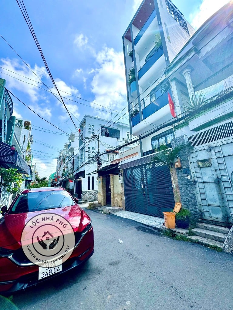 BÁN NHÀ LÊ VĂN THỌ, GÒ VẤP, HẺM XE TẢI, 5 TẦNG, CÓ GARA, THANG MÁY, GIÁ 10,9 TỶ