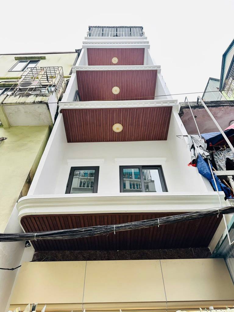 Bán nhà Hào Nam, Đống Đa, dt 40m2 5 tầng thang máy, giá 10.8 tỷ, ngõ thông, gần phố