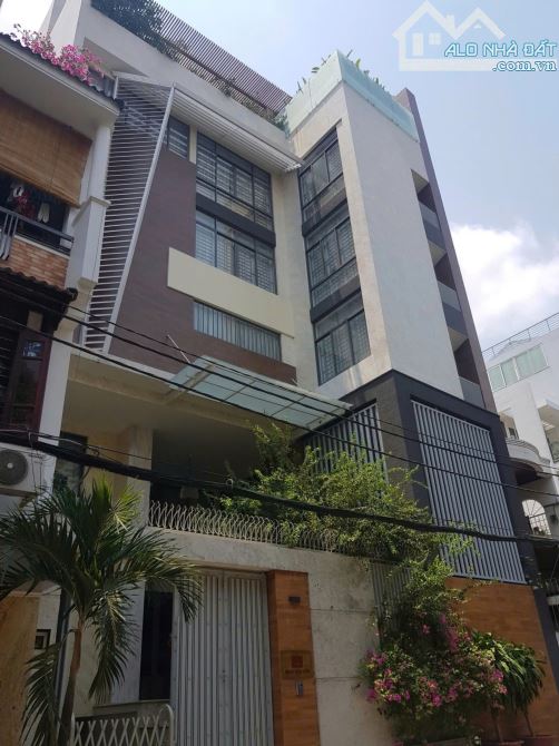 Bán biệt thự có hồ bơi đường Lê Văn Huân, P13, Tân Bình. (12x16m) Hầm 8 tầng, giá 66 tỷ