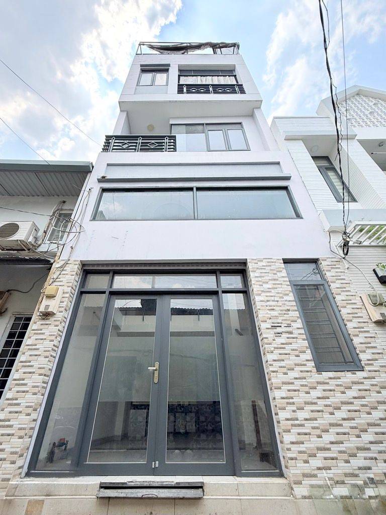 BÁN NHÀ SÁT MẶT TIỀN PHẠM VĂN ĐỒNG BÌNH THẠNH, HẺM 4M 5 TẦNG BTCT, 4PN MASTER 4WC