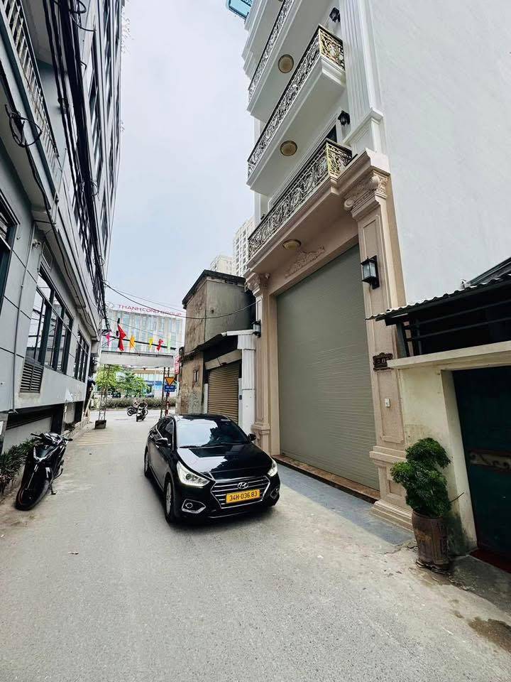 BÁN NHÀ ĐƯỜNG TAM TRINH, HOÀNG MAI, 7 TẦNG THANG MÁY, GARA Ô TÔ, GIÁ 29,5 TỶ