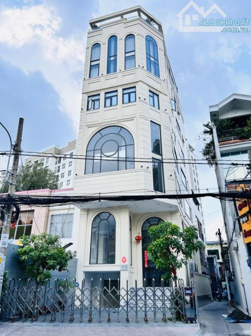 Bán tòa nhà văn phòng hầm, 7 tầng, ~900m2 sàn Lê Quang Định về giá tốt