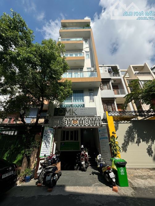 Bán tòa nhà hầm + 6 tầng đường Phổ Quang, P2, Tân Bình. Thu nhập 100 triệu/tháng