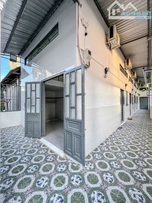 Ngộp bán gấp dãy trọ 7 phòng ngay KCN Tây Bắc - Củ Chi, Sổ hồng riẻng ,125m2, 920 triệu