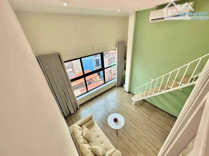 Bán toà CHDV Minh Khai VF3 vào nhà, 3 thoáng lô góc 70m2*7T TM 18PN DT 1 tỷ/năm gần NEU