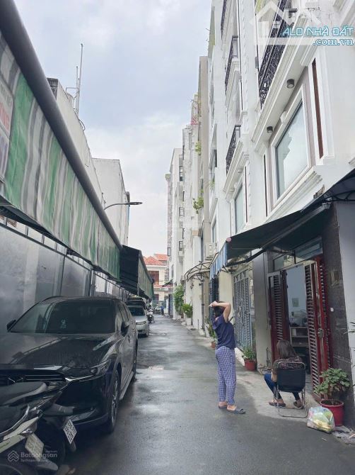 BÁN NHÀ HẺM XE HƠI. P7- Q BÌNH THẠNH. DT: 4,5X12M. 5 TẦNG NHÀ MỚI Ở NGAY. GIÁ 11 TỶ