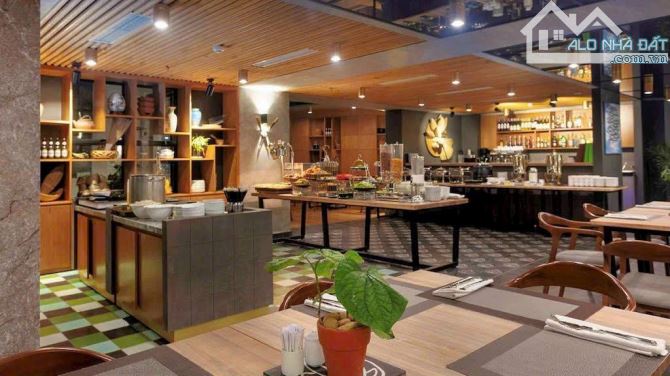Tòa Khách sạn mặt phố Nguyễn Trường Tộ, DT 400m2 MT 16m, 16 tầng, 98 phòng Giá 338 Tỷ