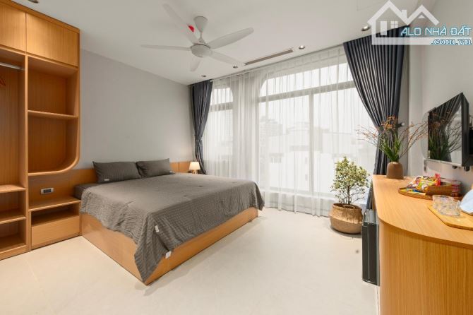 Bán toà nhà dòng tiền Thịnh Quang 60m2*7T thang máy, 16pkk, lô góc.