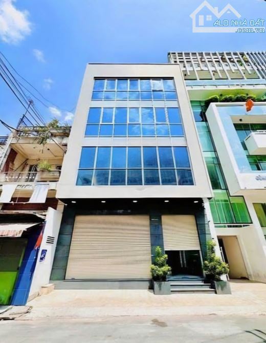 Bán Tòa Nhà Văn Phòng Mặt Tiền Đường Phạm Văn Chiêu-DT 6x33m-4 Tầng-TN 300triệu- giá 35ty