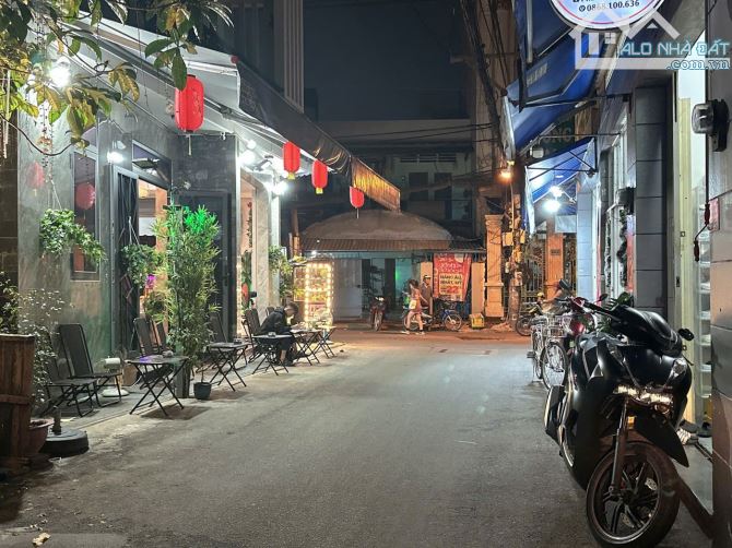 Bán CHDV hẻm 8m Quang Trung ngang 6.7m 134m2 6 lầu 21PN T.máy DT 115tr 26 tỷ gần chợ HTT.