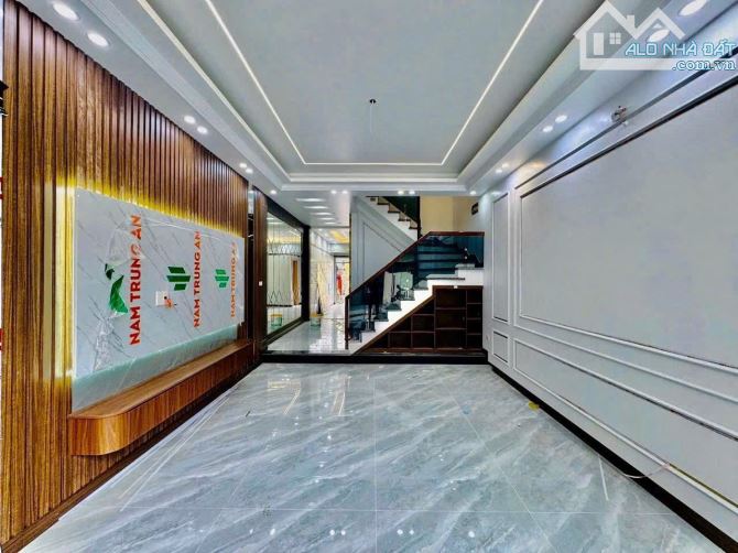 Bán căn nhà 4 tầng thang máy, 2 mặt đường khu phân lô đường Văn Cao, dt 67m2, mt4,5m