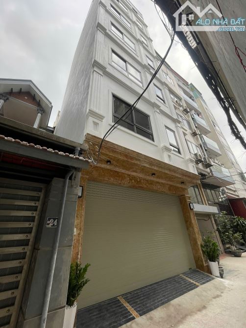 NHÀ SÁT PHỐ 2 MẶT NGÕ 21 TỶ 50m 6 TẦNG MT 4,7m GARA Ô TÔ 7 CHỖ NGUYỄN KHÁNH TOÀN CẦU GIẤY
