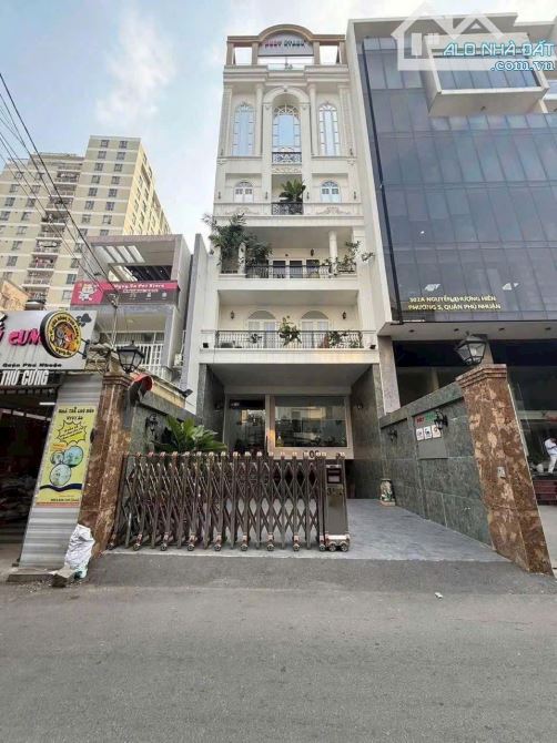 Bán toà nhà VP Nguyễn Thượng Hiền, Phú Nhuận, 7 tầng St, 7.3x25.5m, 185m2, Giá 69 Tỷ