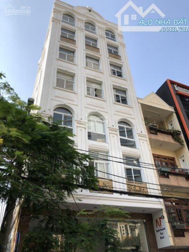 Bán tòa nhà building mặt tiền Bạch Đằng ngay sân bay 10x17m KC hầm 6 tầng HĐ 300 tr giá 49