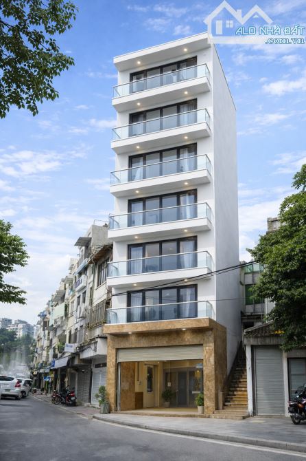 BÁN TÒA VĂN PHÒNG MẶT HỒ PHƯƠNG MAI, ĐỐNG ĐA, HN – 107M – 9 TẦNG THANG MÁY – VỈA HÈ 2 BÊN