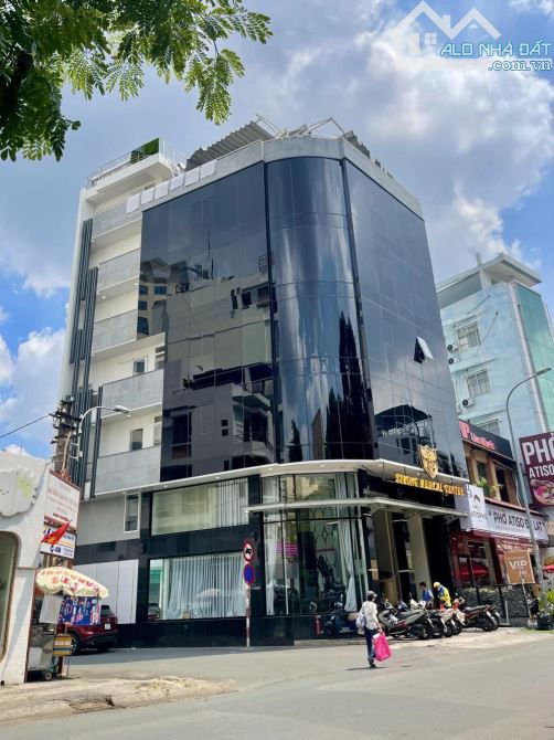 Bán gấp tòa nhà văn phòng căn góc Pasteur-Trần Quốc Toản, dt: 8,5x16m nở hậu 10m hầm 7 lầu
