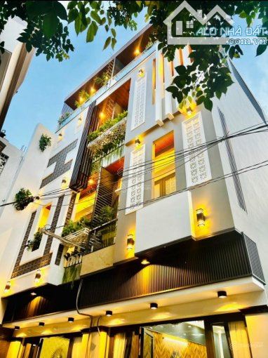 Bán tòa nhà văn phòng MT Giải Phóng, P4, Tân Bình – DT 8x17m, Hầm 5 lầu ST, thang máy