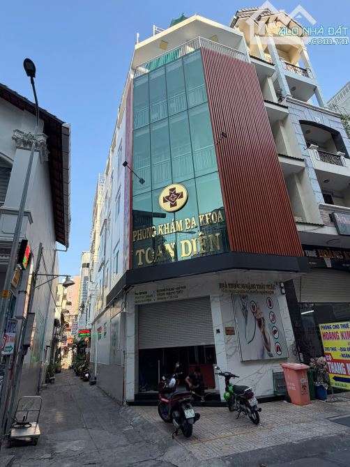 BUILDING GÓC 2 MẶT TIỀN ĐẶNG THÁI THÂN QUẬN 5 HẦM 5 LẦU THANG MÁY GIÁ 33 TỶ