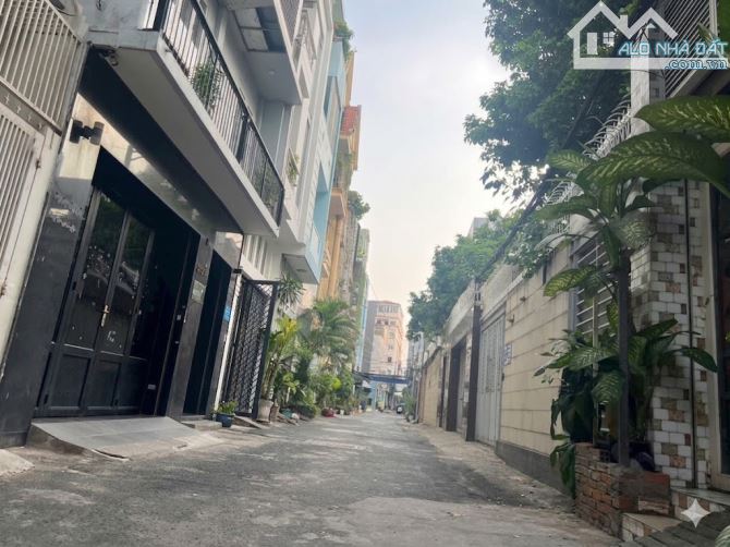 Hẻm xe hơi Ngang 7m Út Tịch Tân Bình - GIá gần 15 tỷ. 10 phòng doanh thu 600tr/năm