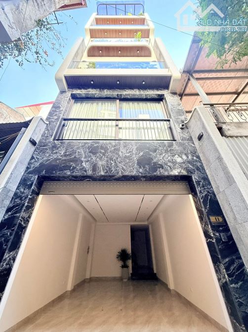 7 tầng thang máy xây mới full nội thất 20m ra Phố Nguyễn Văn Cừ oto vào nhà,57m2 Giá 19 tỷ