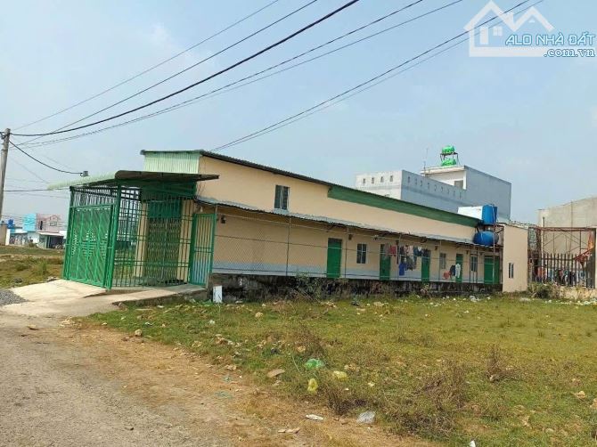 Cần bán gấp nhà trọ KDC Tân Đức 125m2 giá 2.05 tỷ có 5p và 1 kiot cho thuê