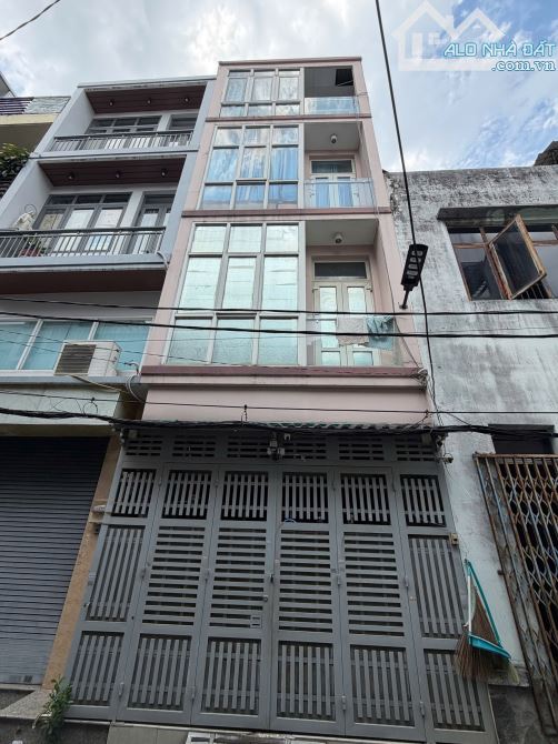 Hàng cực hiếm xe hơi ngủ nhà 4x12m 4 lầu khu phân lô Lê Đức Thọ p15 giá 6.5 tỷ
