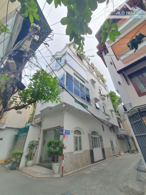 NGỘP NẶNG!! cũ 14 tỷ= 12,5 tỷ TL- Toà nhà 5 tầng- Lô góc 2MT Khu Sân Bay- Đáng mua!!!