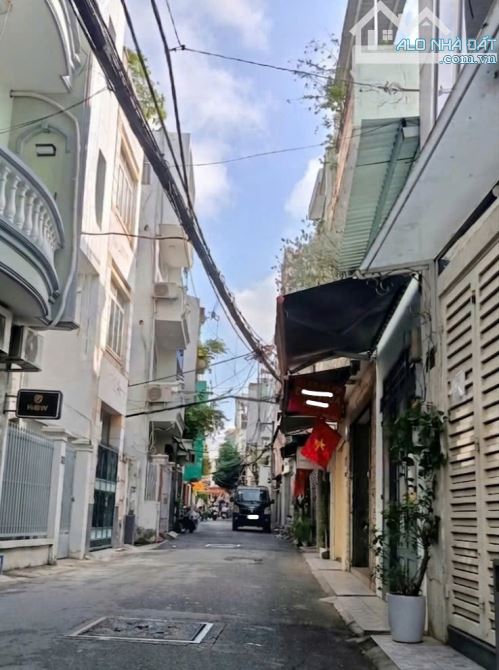 GIÁ TỐT - Bán 5Tầng nhà mới - XE HƠI đậu cửa thông ra đường Đặng Văn Ngữ - Q. Phú Nhuận