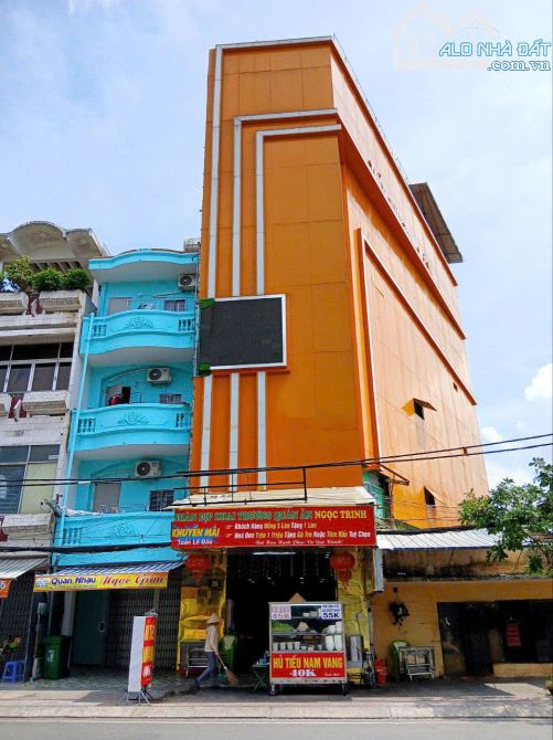 Tòa nhà văn phòng mặt tiền Chợ Lớn P.11 Quận 6 (10NHx16m) 6 tầng thang máy 2x tỷ