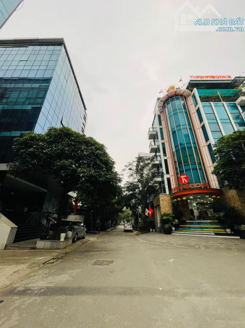 TOÀ NHÀ VĂN PHÒNG MẶT PHỐ 7 TẦNG THANG MÁY +Hầm , 144m2 KHU ĐẤU GIÁ PHÚ DIỄN TT Thể thao