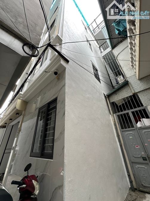 bán gấp nhà xây mới Tam Trinh sát đường mới lô góc, thang máy 38m2 sổ.Giá 9.5 tỷ