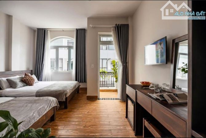 BÁN CĂN HỘ CHUNG CƯ MINI XUÂN LA 8 TẦNG MẶT NGÕ Ô TÔ, DOANH THU 1TỶ/NĂM