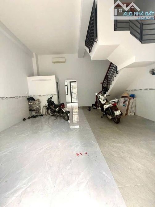 Bán nhà 2 mặt tiền trước sau ngang 7m HXH Thống Nhất P16, 2 lầu ST, giá 11 tỷ TL