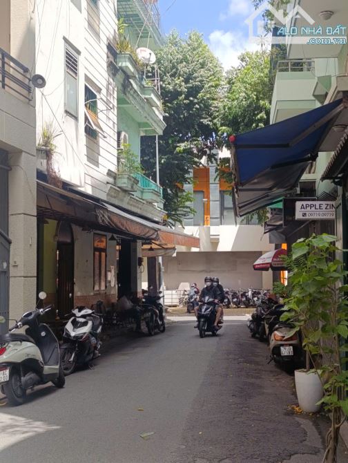 Bán tòa nhà VP 5 tầng góc 2 MT - HXH Hoàng Văn Thụ - Nguyễn Thái Bình, giá 11.5 tỷ TL