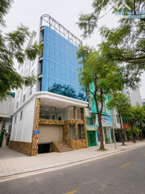 BÁN TÒA NHÀ MẶT PHỐ VŨ TÔNG PHAN. 185M2 - 9 TẦNG. THANG MÁY. LÔ GÓC. THÔNG SÀN.