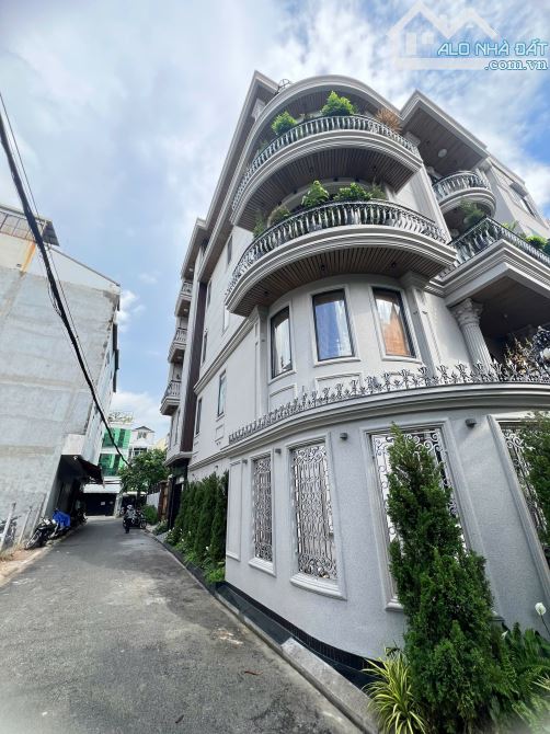 Biệt thự mini 4 lầu đẹp ở ngay, ngang 7m, căn góc đường Hoàng Hoa Thám - Ga T3 - Tân Bình
