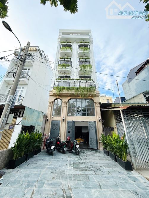 100M²(5.7x16.5)Nở Hậu 6.6m-6Tầng Thang Máy-Đường 11M Thông-18Phòng CHDV-Cho Thuê 100tr/th