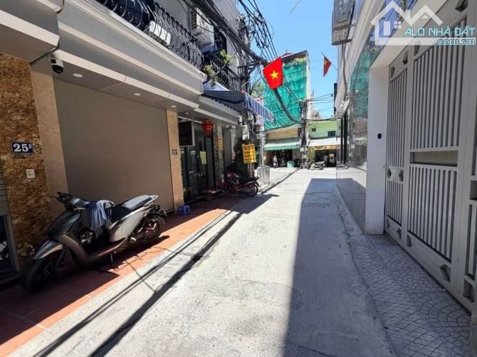 Nhà đẹp 5 tầng xây mới thang máy Xuân La oto kdoanh sầm uất,55m2 sổ. Gấp 13.8 tỷ