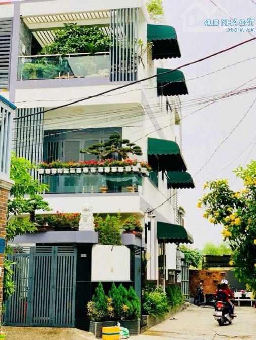 Bán nhà 4 tầng Đình Phong Phú, PhườngTăng Nhơn Phú, TP HCM. DT 55m2. Giá 6,38 tỷ, sổ hồng