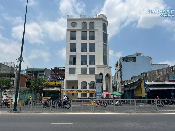 BÁN BULDING 3MT ĐƯỜNG DƯƠNG QUẢNG HÀM,P5 GÒ VẤP .DT:12x20.5m.1H,8 TẦNG.95 TỶ