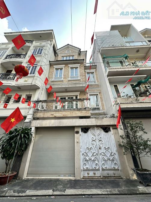 Bán gấp nhà 2MT đường C1, Tân Bình DT 6 x 15,4 nhà 4 tầng giá 20,5 tỷ
