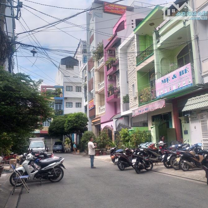 Bán gấp tòa nhà 32PN CHDV hẻm Văn Chung - Ngay Ga T3 - 6 tầng - Ngang 6x26m - HĐT130tr/th