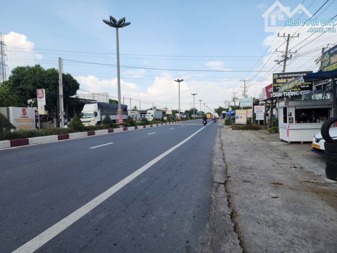BÁN 1000m2 ĐẤT MẶT TIỀN QL1A + NHÀ KHO GẦN CỔNG KCN TRUNG AN,(Phường Trung An)