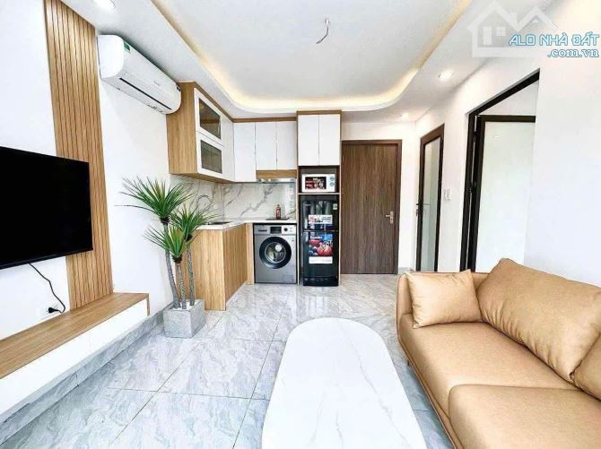 7T thang máy Hoàng Cầu 53m^2, DT 850tr/tháng, CHỈ 19.5 Tỷ. 30m ra mặt phố, mt 7m, nt xịn