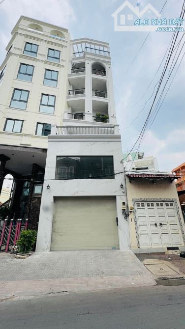 Bán nhà Bình Thạnh Mặt tiền Trần Bình Trọng 88m2 7 tầng thang máy DT 100tr/th 24,5 tỷ