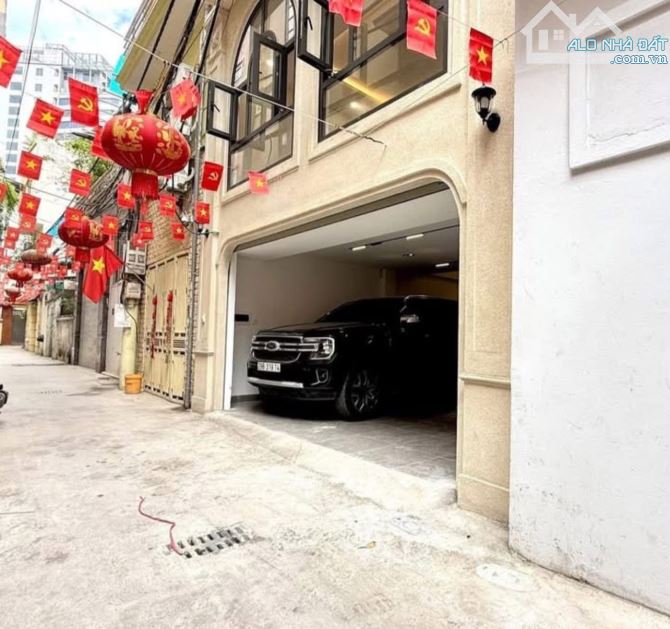 BÁN NHÀ NGOẠI GIAO ĐOÀN - GARA 2 OTO DT 45M2, 6 TẦNG THANG MÁY, MT 5.7M - GIÁ HƠN 15 TỶ
