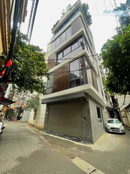 BÁN NHÀ MẶT NGÕ LÔ GÓC 26 TỶ 60m 6 TẦNG MT 5,7m Ô TÔ TRÁNH KINH DOANH ĐÀO TẤN BA ĐÌNH