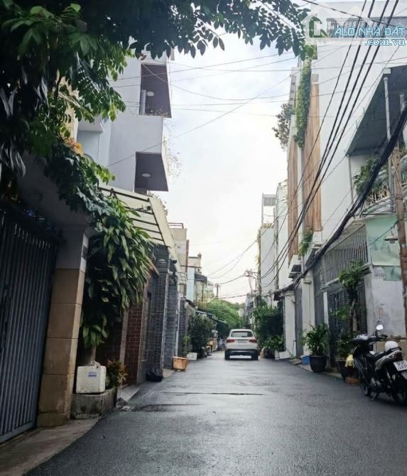 XE HƠI đậu cửa 54m²x4tầng nhà MỚI - ĐẸP thông ra Lê Quang Định